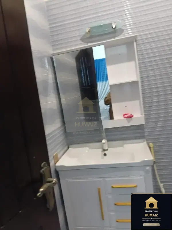100 Sq. Yd. 3-Bedroom Luxury Villa (Basement, 3 Bath, Residence 1) in Zone B For Sale in DHA Phase 8 Karachi — Photograph 10