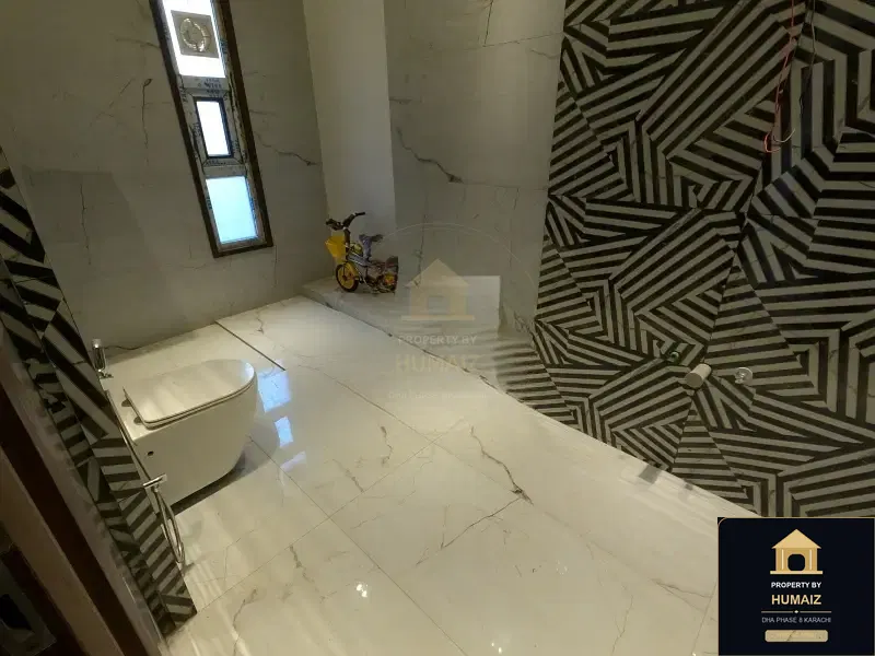 3,000 Sq. Yd. 10-Bedroom Luxury Villa on Khayaban-e-Iqbal For Sale in DHA Phase 8 Karachi — Photograph 13