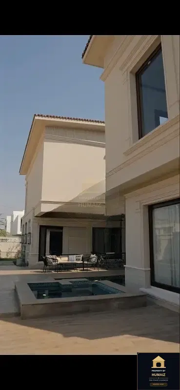 1,000 Sq. Yd. 6-Bedroom Luxury Villa (Private Pool, 6 Bath, Residence 9) in Zone A For Sale in DHA Phase 8 Karachi — Photograph 5