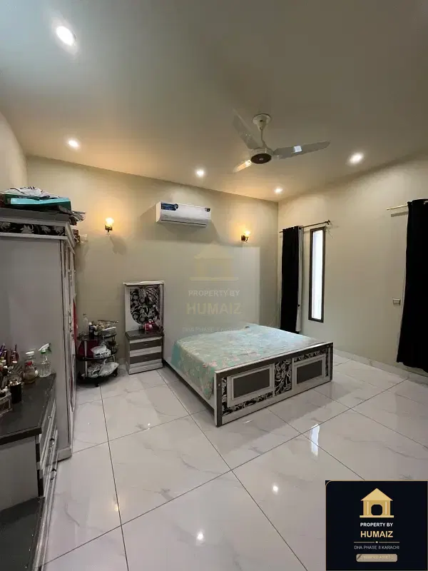 150 Sq. Yd. 4-Bedroom Luxury Villa (Basement, 4 Bath, Residence 1) in DHA Phase 8 For Rent in DHA Phase 8 Karachi — Photograph 2