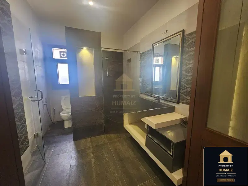 500 Sq. Yd. 6-Bedroom Luxury Villa (Basement, 7 Bath, Residence 5) in DHA Phase 8 For Rent in DHA Phase 8 Karachi — Photograph 10