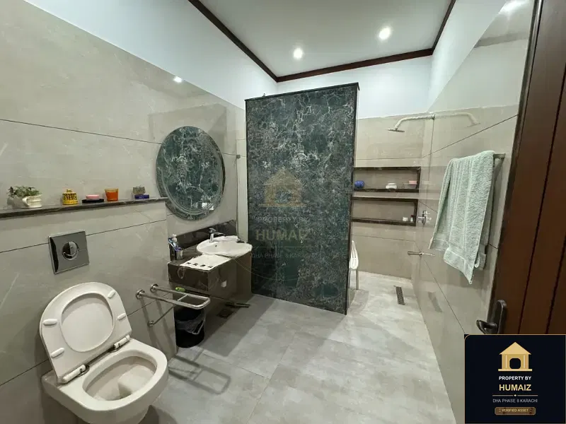 700 Sq. Yd. 6-Bedroom Luxury Villa on Khayaban-e-Faisal For Rent in DHA Phase 8 Karachi — Photograph 27