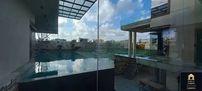 2,000 Sq. Yd. 8-Bedroom Luxury Villa (Private Pool, 7 Bath, Residence 3) in DHA Phase 8 For Sale in DHA Phase 8 Karachi — Photograph 12
