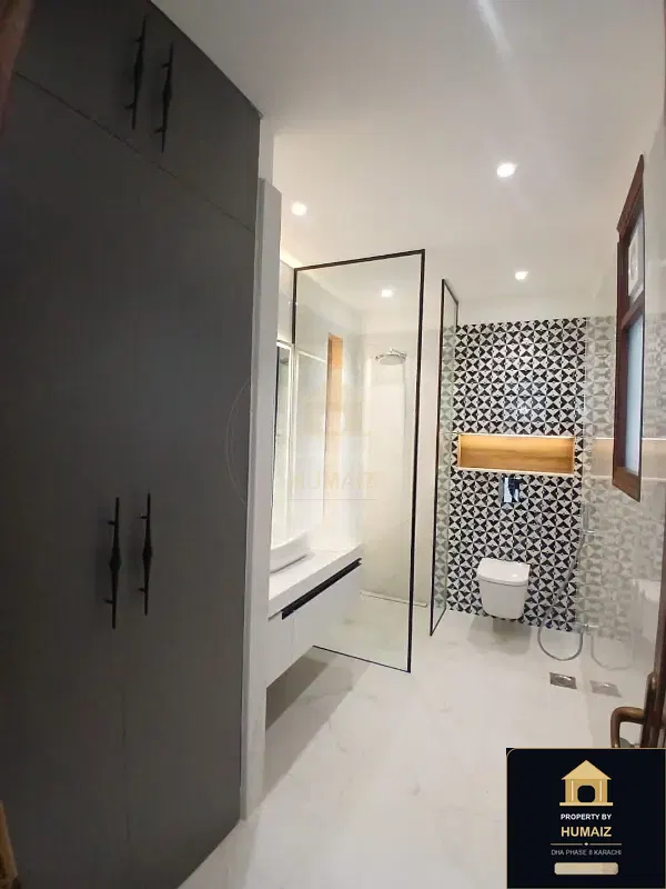 666 Sq. Yd. 5-Bedroom Luxury Villa (Basement, 6 Bath, Residence 1) in Zone A For Sale in DHA Phase 8 Karachi — Photograph 12