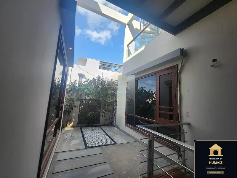 500 Sq. Yd. 6-Bedroom Luxury Villa (Basement, 7 Bath, Residence 5) in DHA Phase 8 For Rent in DHA Phase 8 Karachi — Photograph 2