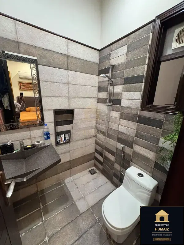 100 Sq. Yd. 4-Bedroom Luxury Villa (Basement, 5 Bath, Residence 16) in DHA Phase 8 For Sale in DHA Phase 8 Karachi — Photograph 10
