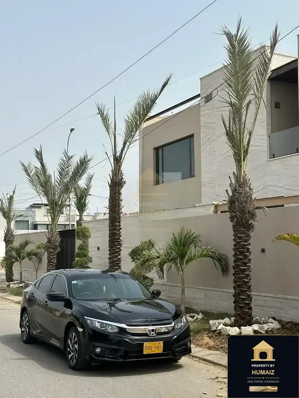 1,000 Sq. Yd. 7-Bedroom Luxury Villa on Khayaban-e-Iqbal For Sale in DHA Phase 8 Karachi — Photograph 9