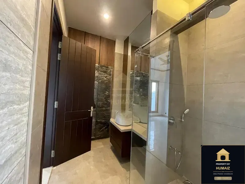 666 Sq. Yd. 6-Bedroom Luxury Villa in Khayaban-e-Bahria For Sale in DHA Phase 8 Karachi — Photograph 12