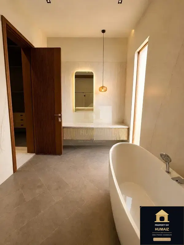 1,000 Sq. Yd. 6-Bedroom Luxury Villa (Private Pool, 6 Bath, Residence 1) on Khayaban-e-Ghalib For Sale in DHA Phase 8 Karachi — Photograph 6