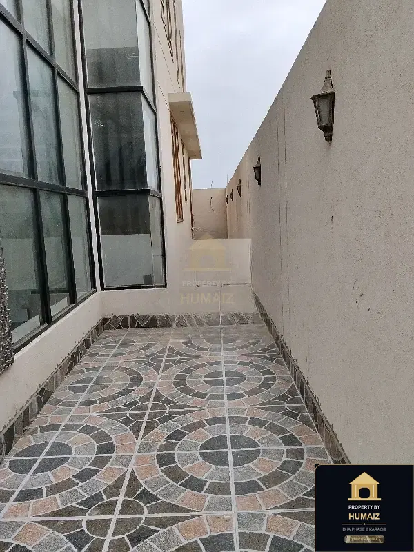 300 Sq. Yd. 4-Bedroom Luxury Villa (Basement, 4 Bath, Residence 3) in Khayaban-e-Sahil For Sale in DHA Phase 8 Karachi — Photograph 6