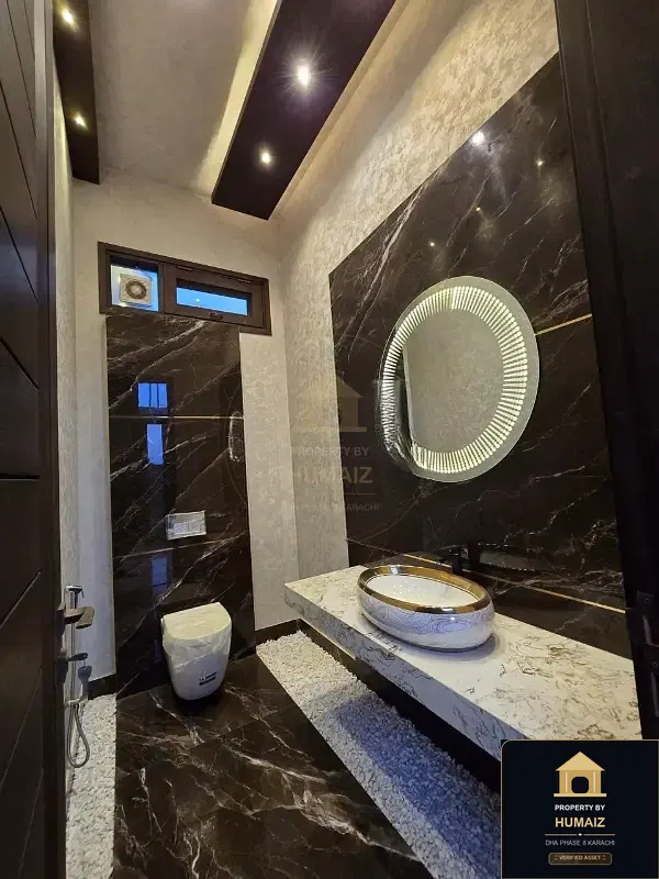 1,000 Sq. Yd. 7-Bedroom Luxury Villa (Basement, 7 Bath, Residence 1) in Khayaban-e-Ittehad For Sale in DHA Phase 8 Karachi — Property by Humaiz Architectural Asset