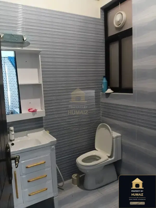 100 Sq. Yd. 3-Bedroom Luxury Villa (Basement, 3 Bath, Residence 1) in DHA Phase 8 For Sale in DHA Phase 8 Karachi — Photograph 13