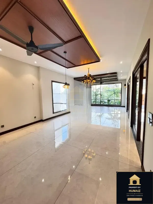 1,000 Sq. Yd. 6-Bedroom Luxury Villa (Private Pool, 6 Bath, Residence 12) in Zone A For Sale in DHA Phase 8 Karachi — Photograph 3
