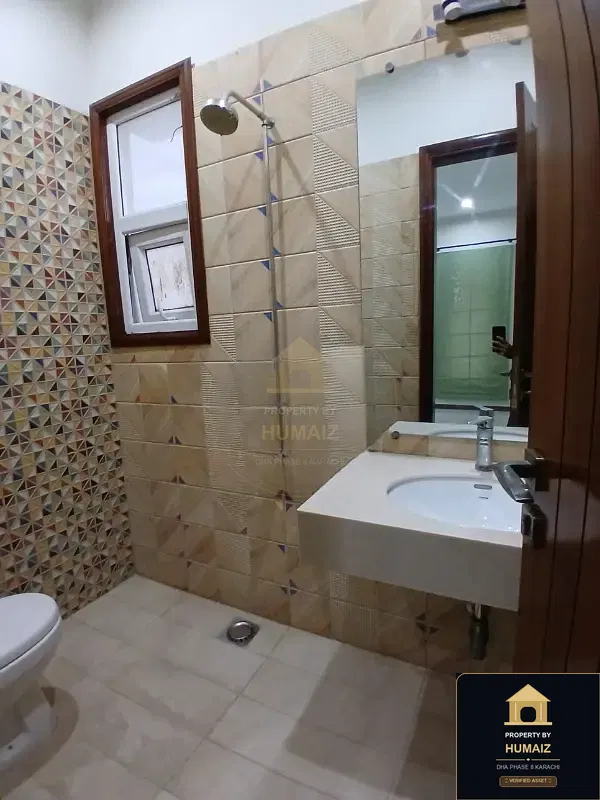120 Sq. Yd. 4-Bedroom Luxury Villa on Khayaban-e-Iqbal For Rent in DHA Phase 8 Karachi — Photograph 10