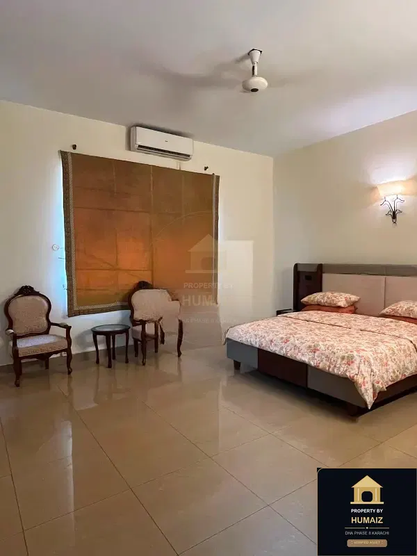 1,000 Sq. Yd. 6-Bedroom Luxury Villa (7 Bath, Residence 18) in DHA Phase 8 For Rent in DHA Phase 8 Karachi — Photograph 9