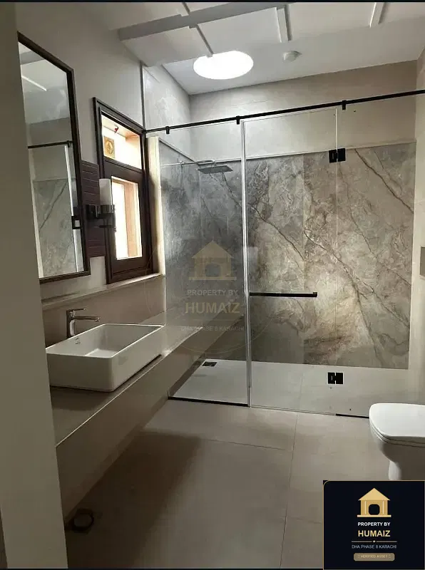 1,000 Sq. Yd. 6-Bedroom Luxury Villa on Qasim Street For Sale in DHA Phase 8 Karachi — Photograph 9