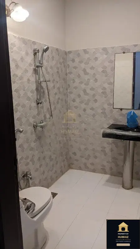 100 Sq. Yd. 4-Bedroom Luxury Villa on Khayaban-e-Iqbal For Rent in DHA Phase 8 Karachi — Photograph 9