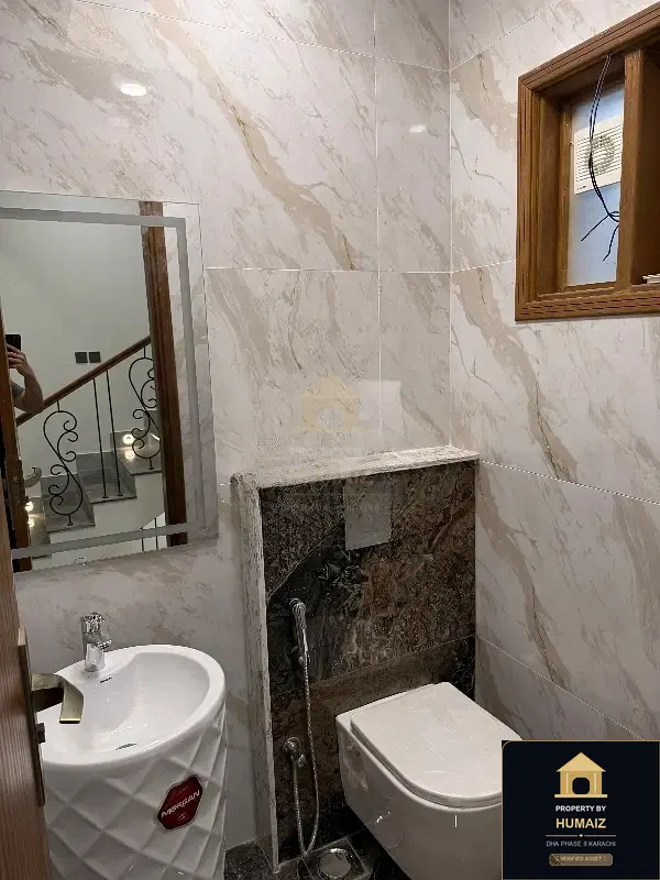 100 Sq. Yd. 4-Bedroom Luxury Villa (West Open, 5 Bath, Residence 24) in DHA Phase 8 For Sale in DHA Phase 8 Karachi — Property by Humaiz Architectural Asset