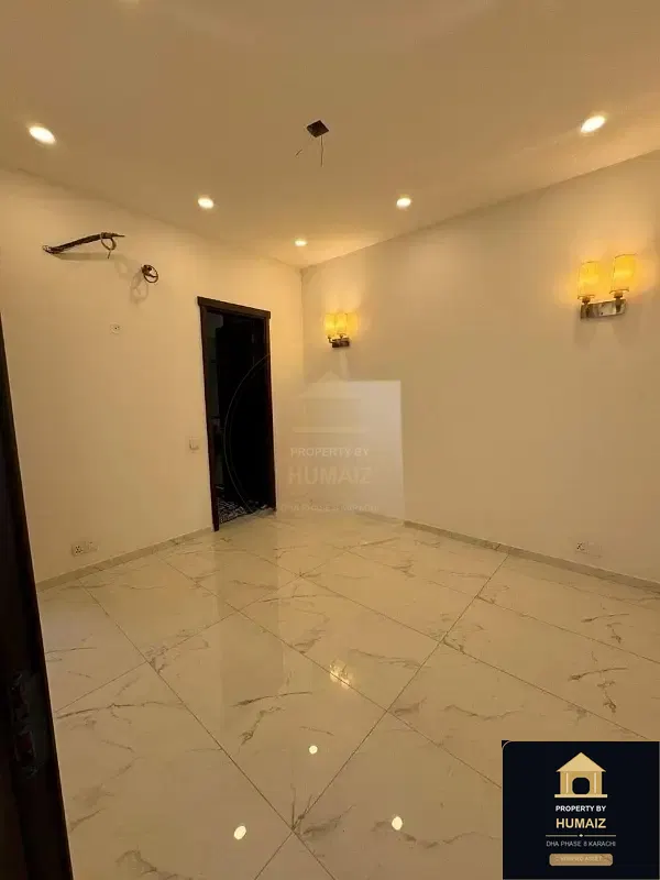 120 Sq. Yd. 4-Bedroom Luxury Villa in Zone A For Rent in DHA Phase 8 Karachi — Photograph 7