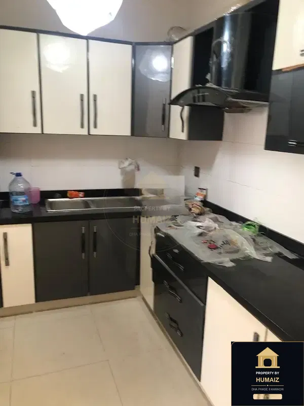 120 Sq. Yd. 4-Bedroom Luxury Villa (Basement, 4 Bath, Residence 1) in DHA Phase 8 For Rent in DHA Phase 8 Karachi — Photograph 2
