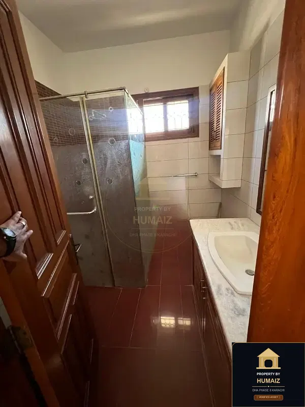 500 Sq. Yd. 6-Bedroom Luxury Villa (Basement, 6 Bath, Residence 1) in Zone A For Rent in DHA Phase 8 Karachi — Photograph 11
