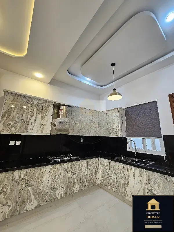 100 Sq. Yd. 5-Bedroom Luxury Villa (Basement, 5 Bath, Residence 2) in DHA Phase 8 For Sale in DHA Phase 8 Karachi — Photograph 6