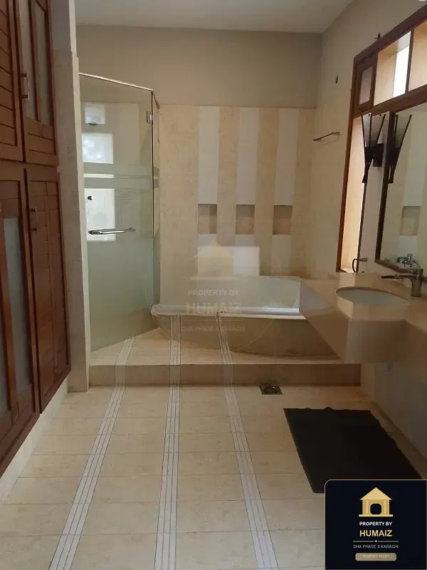 1,000 Sq. Yd. 6-Bedroom Luxury Villa (Private Pool, 6 Bath, Residence 1) in Khayaban-e-Tariq For Sale in DHA Phase 8 Karachi — Photograph 18