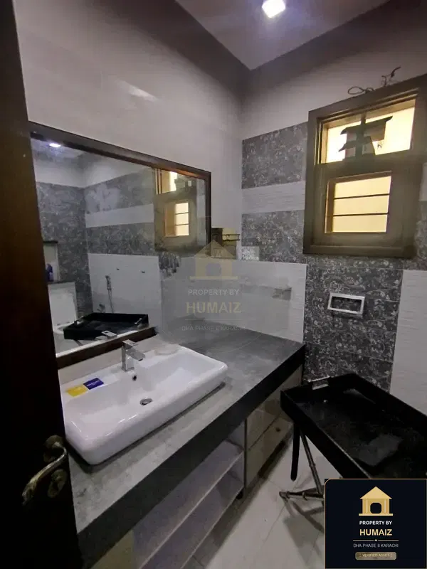 500 Sq. Yd. 5-Bedroom Luxury Villa (Brand New, 6 Bath, Residence 4) in Zone E For Sale in DHA Phase 8 Karachi — Photograph 8
