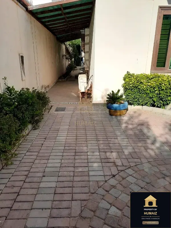 1,000 Sq. Yd. 6-Bedroom Luxury Villa (6 Bath, Residence 30) in DHA Phase 8 For Sale in DHA Phase 8 Karachi — Photograph 18