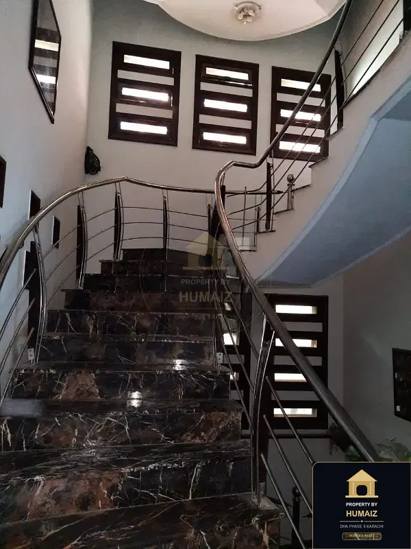 1,000 Sq. Yd. 6-Bedroom Luxury Villa (6 Bath, Residence 31) in DHA Phase 8 For Sale in DHA Phase 8 Karachi — Photograph 7