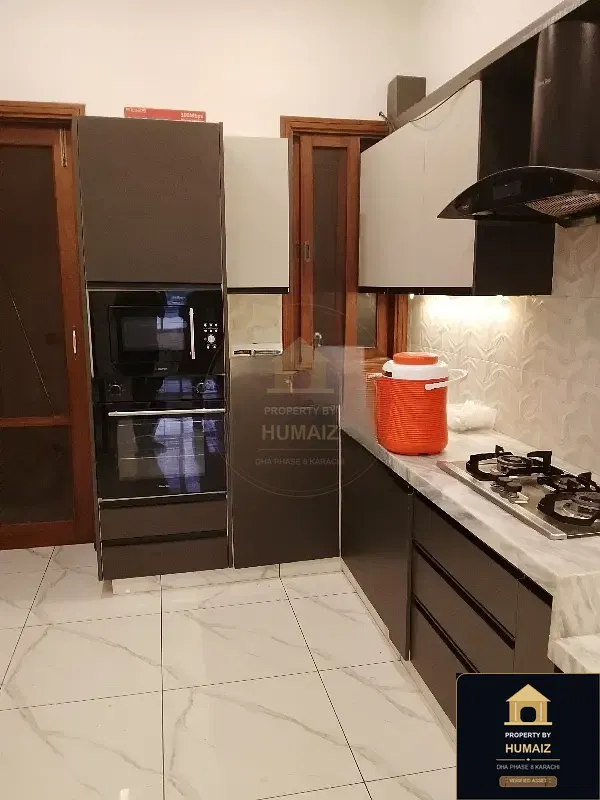 120 Sq. Yd. 4-Bedroom Luxury Villa (Basement, 5 Bath, Residence 4) in DHA Phase 8 For Rent in DHA Phase 8 Karachi — Photograph 3
