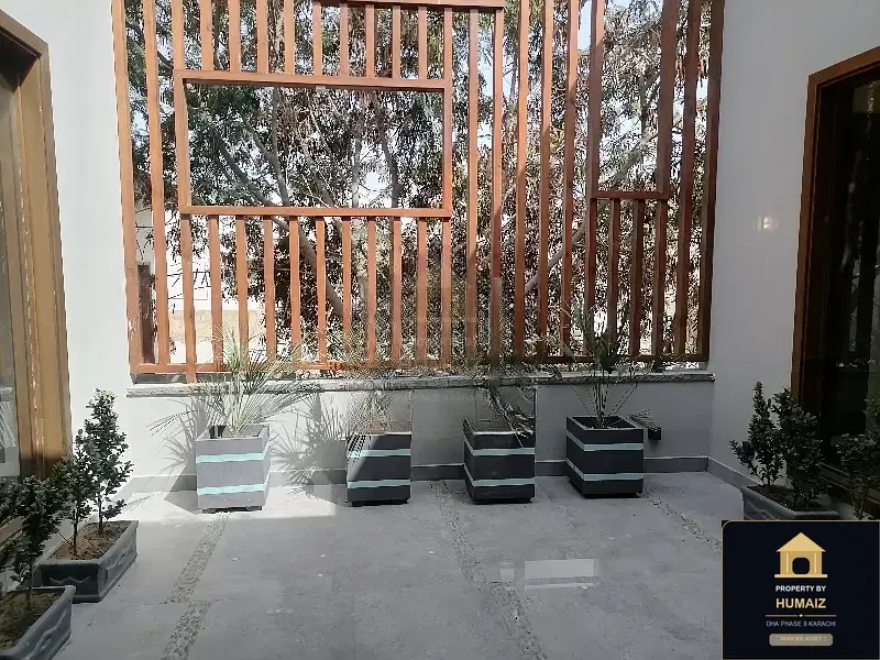 500 Sq. Yd. 6-Bedroom Luxury Villa (6 Bath, Residence 33) in DHA Phase 8 For Rent in DHA Phase 8 Karachi — Photograph 6