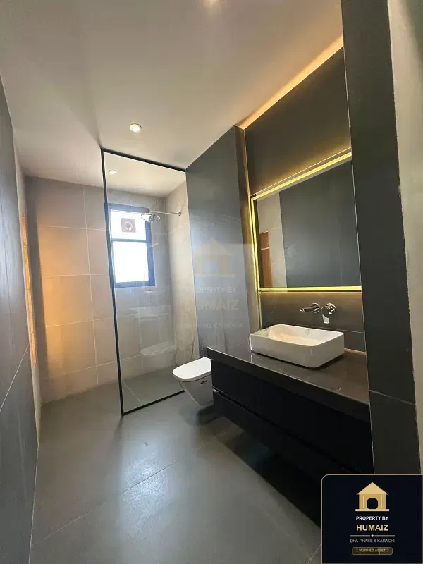 1,000 Sq. Yd. 6-Bedroom Luxury Villa (Basement, 6 Bath, Residence 60) in DHA Phase 8 For Sale in DHA Phase 8 Karachi — Photograph 3