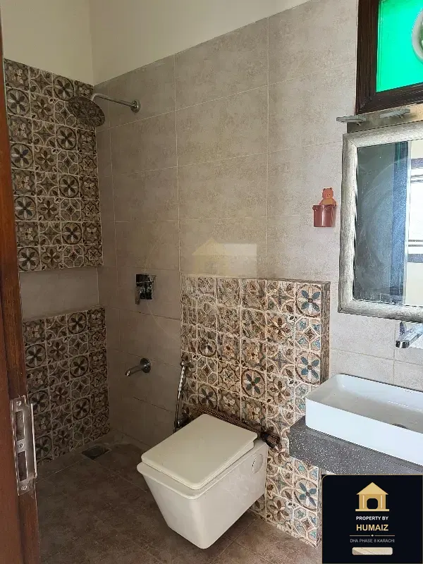 100 Sq. Yd. 4-Bedroom Luxury Villa (Basement, 4 Bath, Residence 2) in DHA Phase 8 For Rent in DHA Phase 8 Karachi — Photograph 9