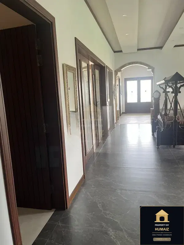 700 Sq. Yd. 6-Bedroom Luxury Villa on Khayaban-e-Faisal For Sale in DHA Phase 8 Karachi — Photograph 13