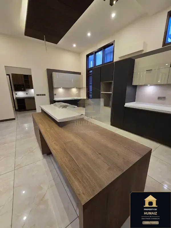 1,000 Sq. Yd. 7-Bedroom Luxury Villa (Basement, 7 Bath, Residence 1) in Khayaban-e-Ittehad For Sale in DHA Phase 8 Karachi — Photograph 4