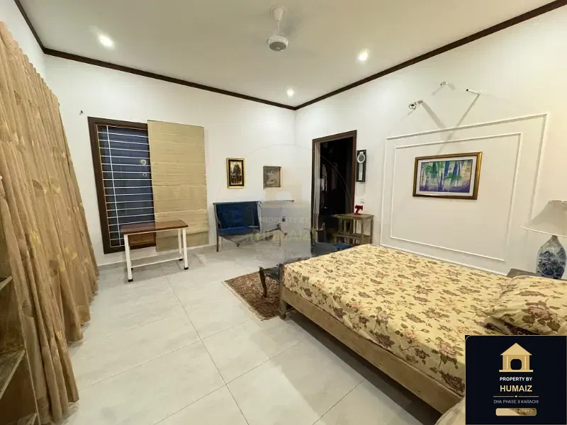 700 Sq. Yd. 6-Bedroom Luxury Villa on Khayaban-e-Faisal For Rent in DHA Phase 8 Karachi — Photograph 4