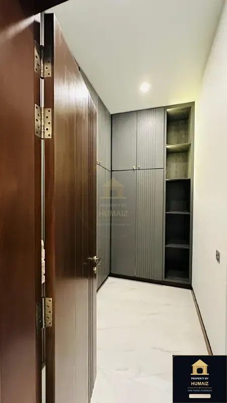 1,000 Sq. Yd. 6-Bedroom Luxury Villa (Basement, 7 Bath, Residence 5) in Zone A For Sale in DHA Phase 8 Karachi — Photograph 10